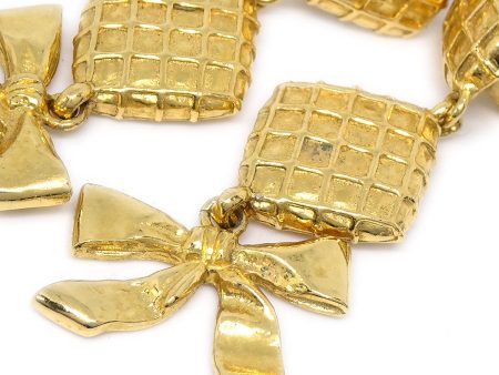 Chanel 1980s Dangle Bow Earrings Clip-On Gold For Sale