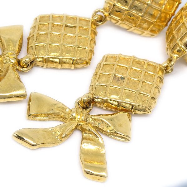 Chanel 1980s Dangle Bow Earrings Clip-On Gold For Sale